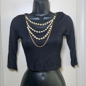Chic Black Crop Top with Gold Chain Details